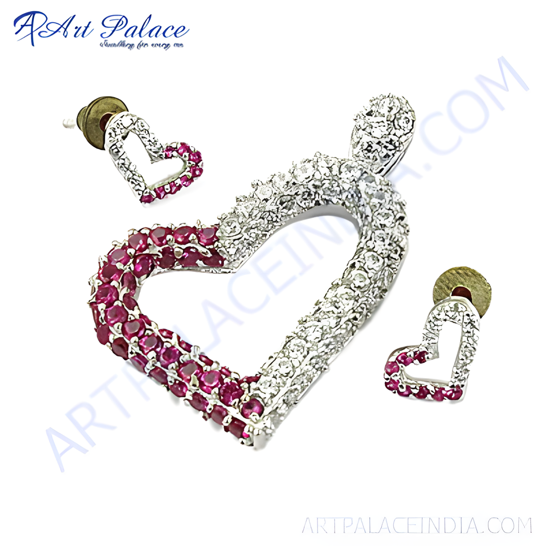 Silver heart-shaped ruby stud earrings and matching pendant, perfect for everyday wear.