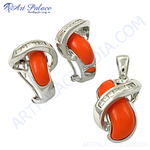 Load image into Gallery viewer, Sterling silver coral gemstone earrings and pendant set. Orange coral on white background.
