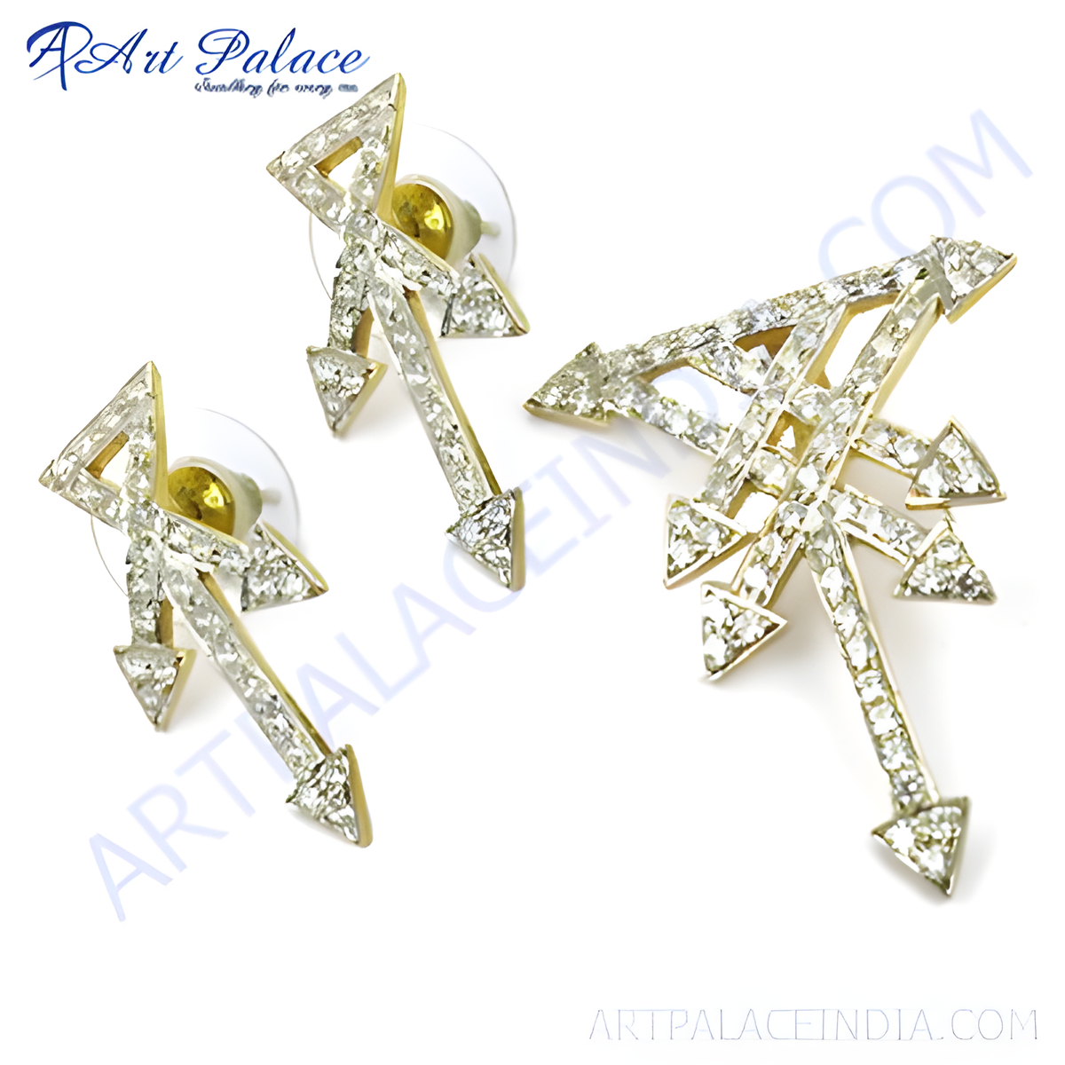 Gold tone crystal arrow earrings and brooch set, perfect for special occasions