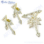 Load image into Gallery viewer, Gold-tone crystal arrow earrings and brooch set, perfect for special occasions. Features sparkling crystal accents.
