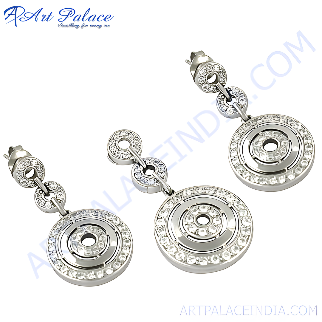 Silver dangle earrings with sparkling crystals. Features a three-circle design and posts for pierced ears. The earrings are made of silver.