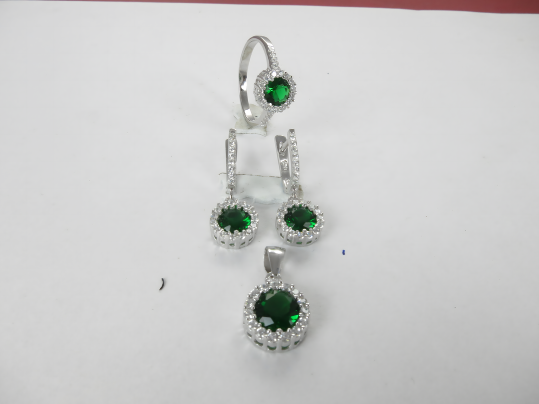 925 sterling silver emerald ring and earrings set with green gemstone and cubic zirconia details