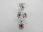 Load image into Gallery viewer, Silver ruby jewelry set, featuring a ring, earrings and pendant with pink gemstones.
