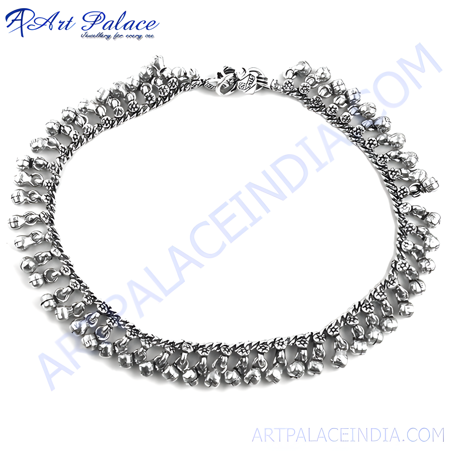 Sterling silver anklet with delicate chain and dangling bells, a beautiful piece of Indian jewelry for women