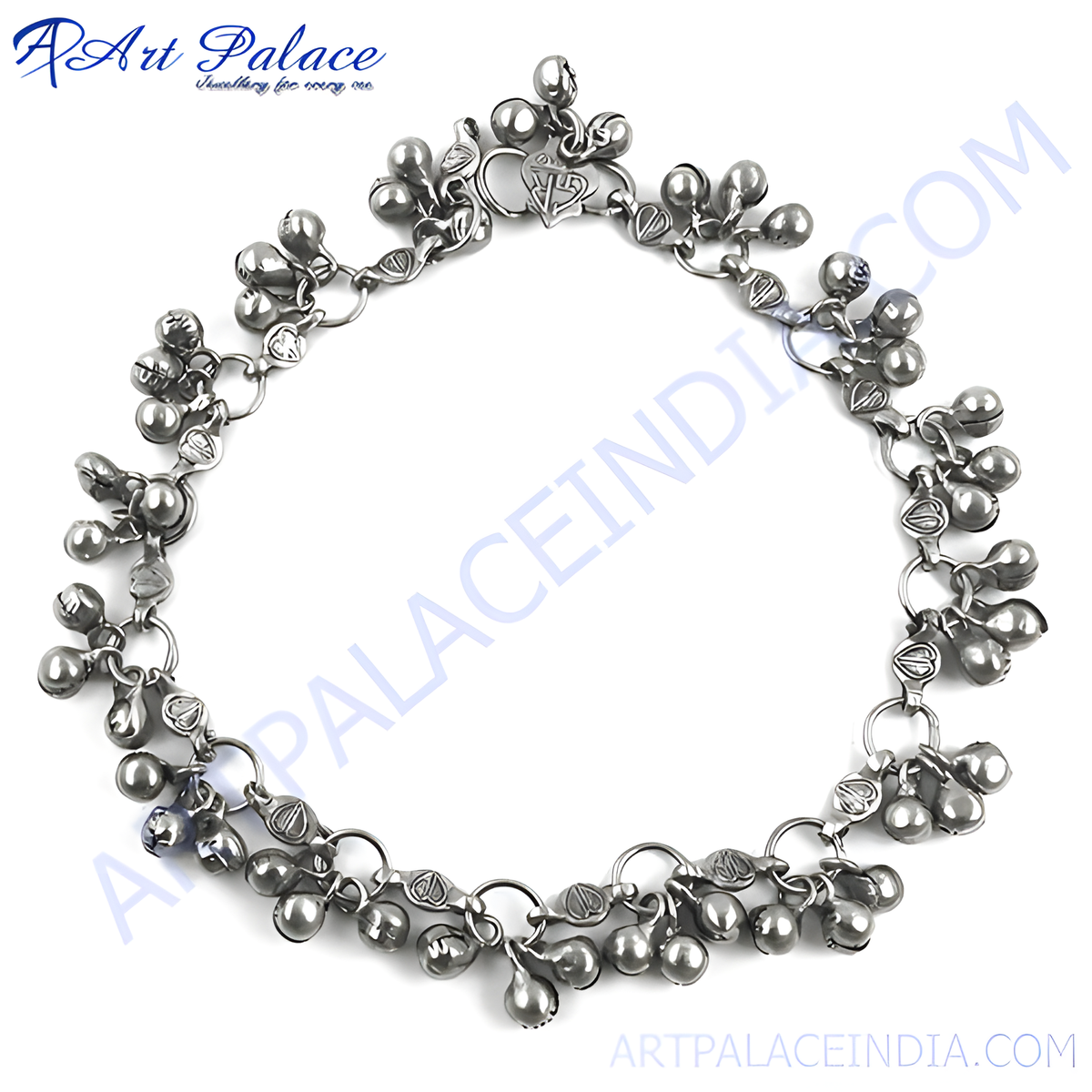 Silver anklet with dangling bells on a white background, perfect for women's fashion and accessories
