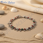 Load image into Gallery viewer, 925 sterling silver anklet with red, green and white enamel flower accents on a white background.
