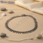 Load image into Gallery viewer, Sterling silver chain anklet with clover charms on a white background, perfect for everyday wear.
