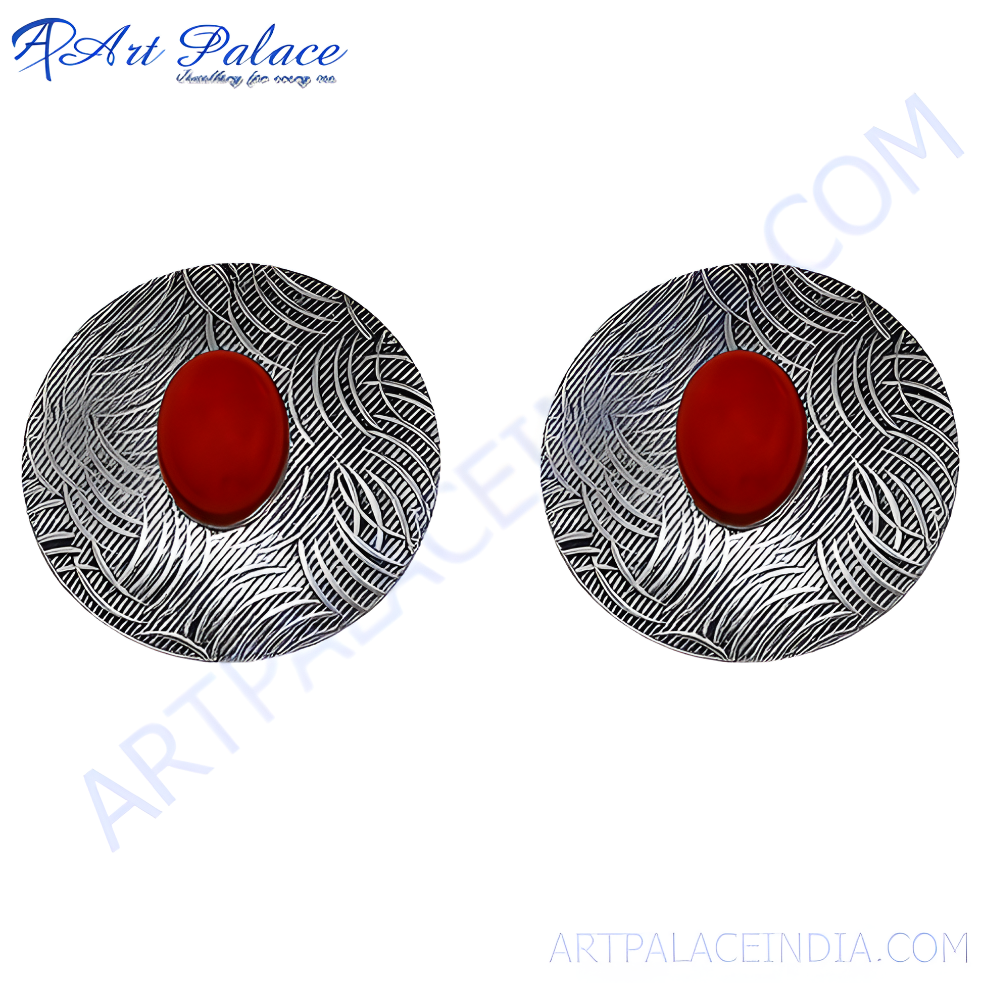 Silver stud earrings with a red oval gemstone center, featuring an intricate silver pattern.