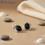 Load image into Gallery viewer, 925 Sterling silver dangle earrings with oval black onyx gemstones, perfect for any occasion.
