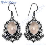 Load image into Gallery viewer, 925 sterling silver dangle earrings with oval moonstone gemstones and intricate design
