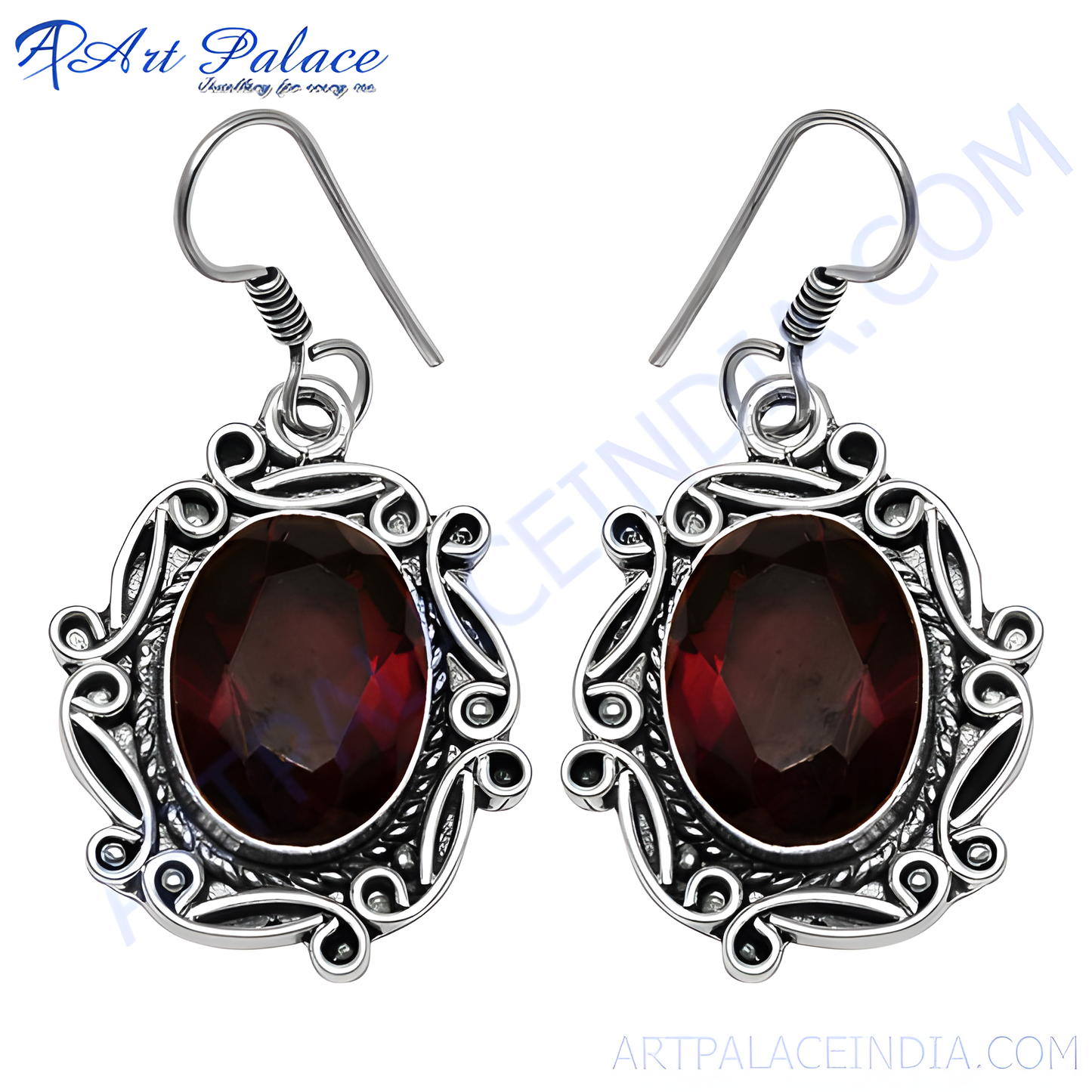 925 sterling silver drop earrings with oval red garnet gemstones.
