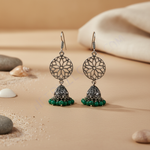 Load image into Gallery viewer, 925 sterling silver dangle earrings with filigree design and green beads.
