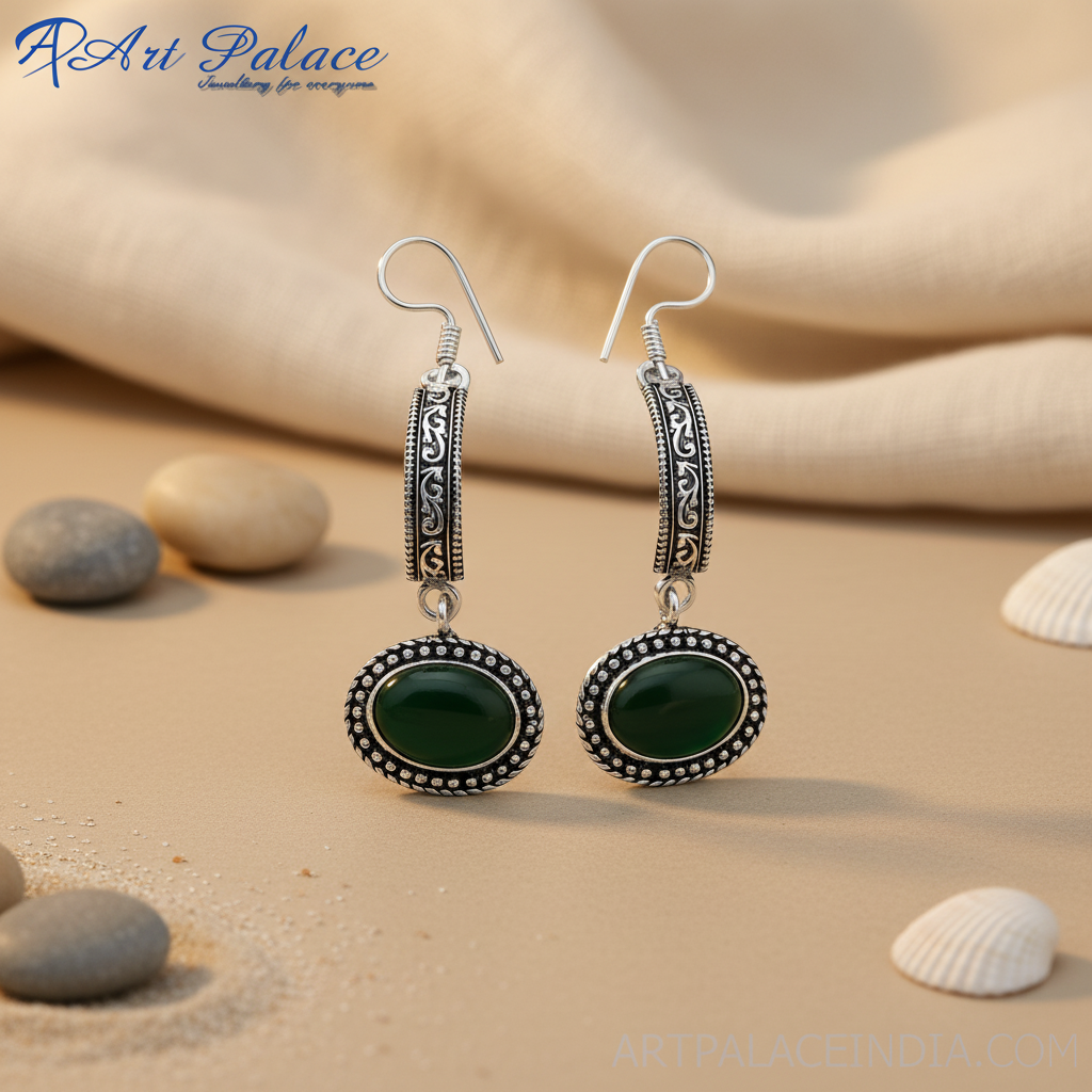 Sterling silver drop earrings featuring oval green onyx gemstones, perfect for any occasion