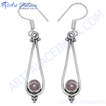 Load image into Gallery viewer, 925 sterling silver teardrop earrings with a round pink gemstone set in the center. Dangle design for women.
