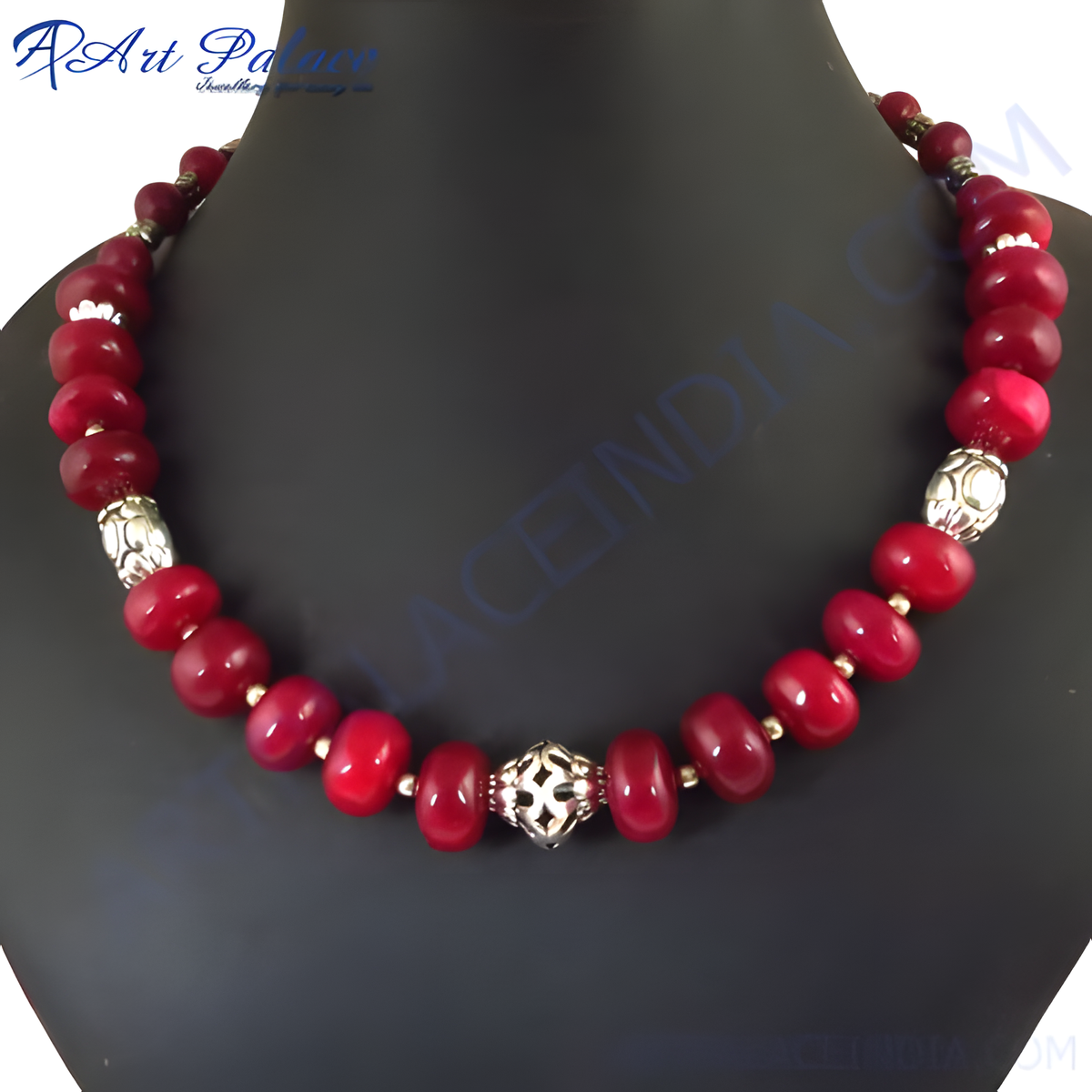Red beaded necklace with silver accents, a statement piece for women