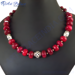 Load image into Gallery viewer, Red beaded necklace with silver accents, a statement piece for women.

