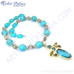 Load image into Gallery viewer, Turquoise bead necklace with silver accents, a statement piece for women.
