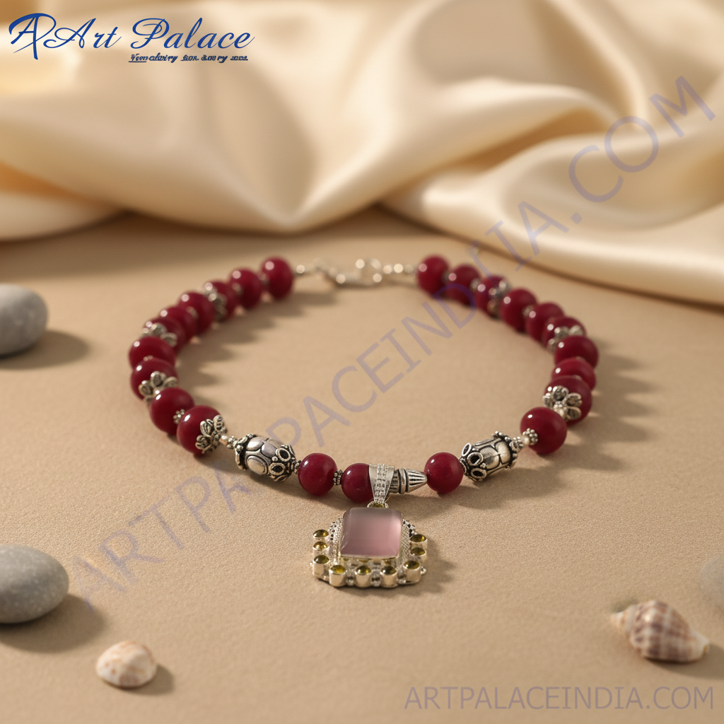 Red agate bead necklace with a silver pendant, featuring a large rectangular gemstone.