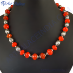 Load image into Gallery viewer, Red gemstone beaded necklace with silver accent beads on a black mannequin, stunning red and silver necklace for women.
