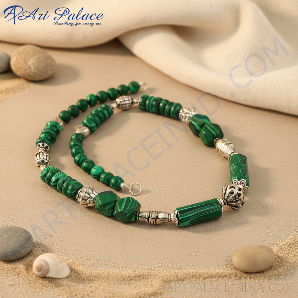 A beautiful malachite stone necklace featuring silver accents on a white background, showcasing the green gemstone.
