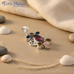 Load image into Gallery viewer, Sterling silver gemstone pendant featuring an oval pink gemstone and other colorful stones.
