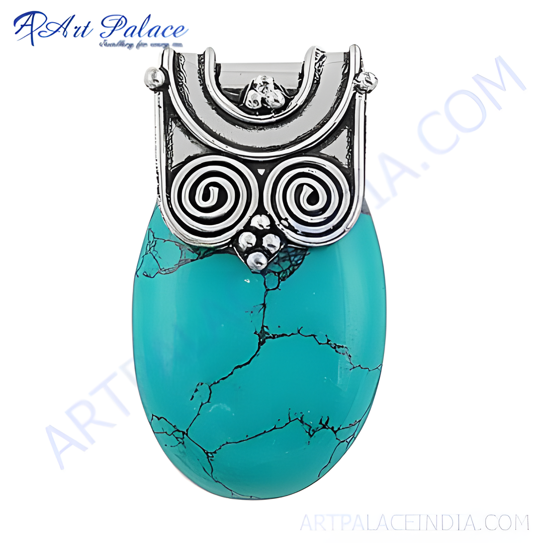 925 sterling silver turquoise pendant with intricate silver detailing and a vibrant blue-green gemstone.