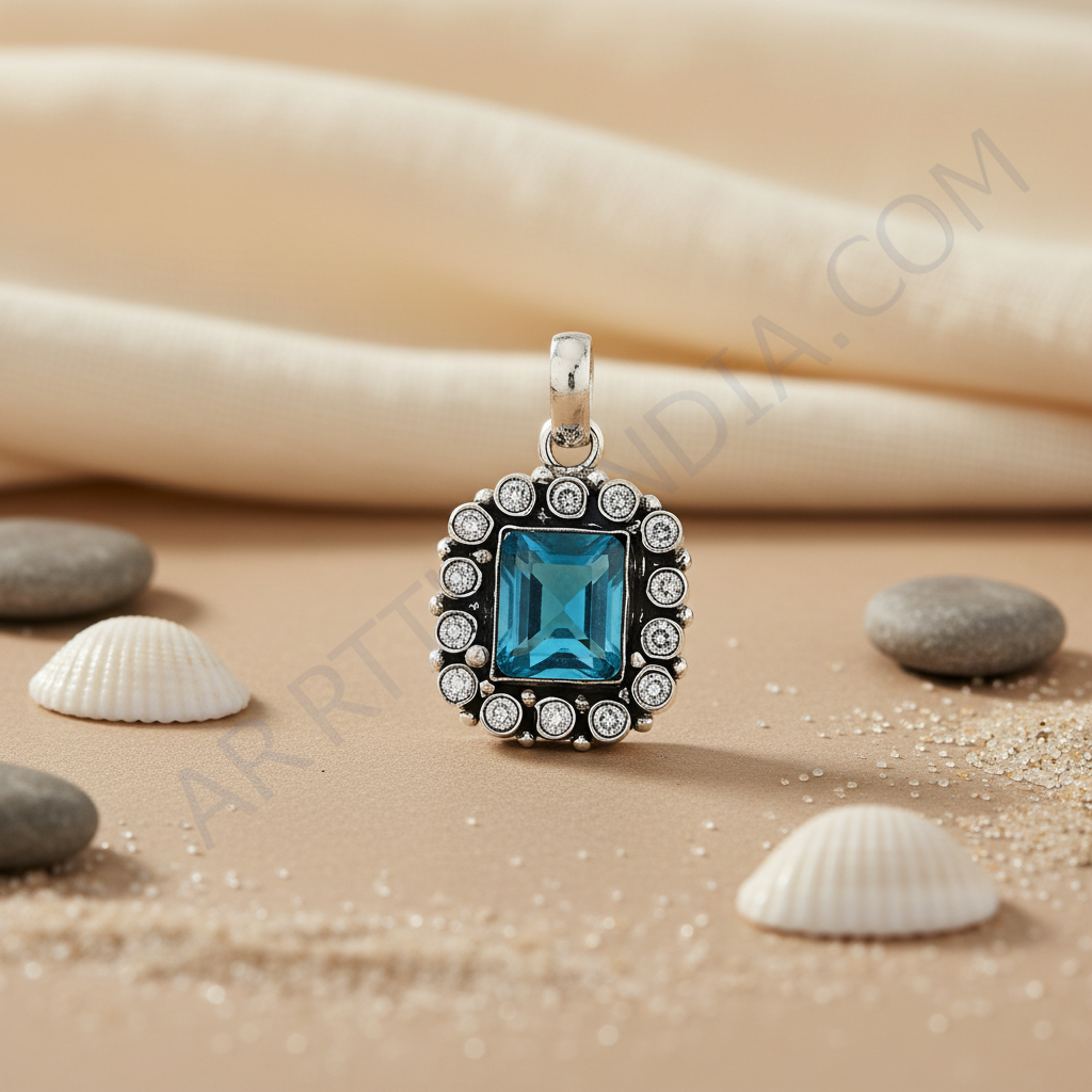 925 sterling silver pendant with a blue topaz gemstone center and white cubic zirconia accents.