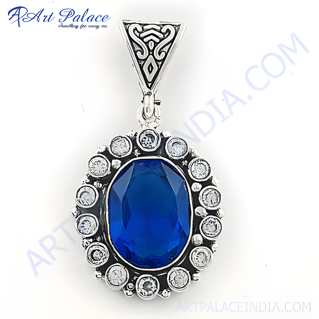 925 sterling silver oval pendant with a large blue gemstone center and surrounding clear gemstones