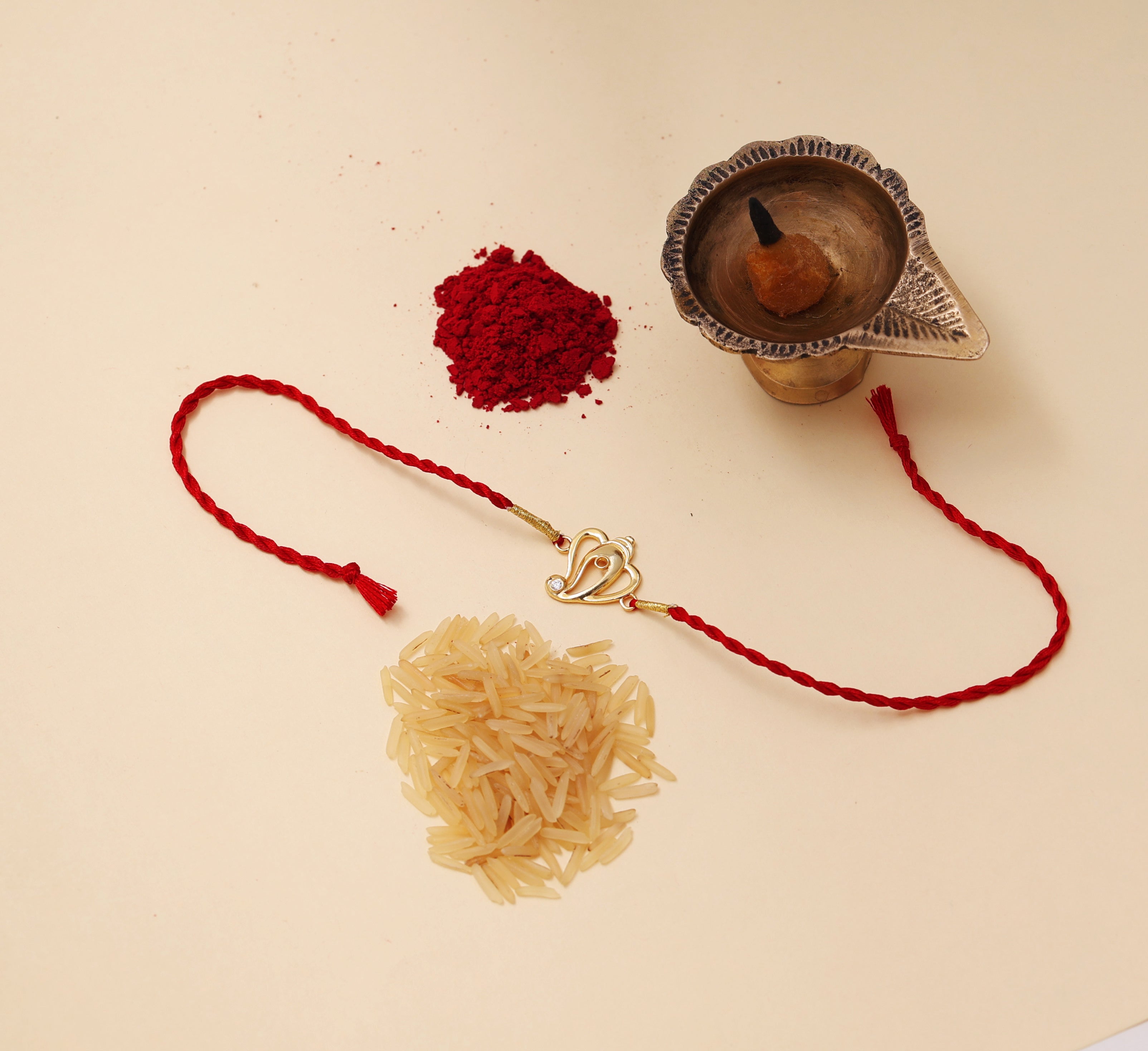 Gold Plated 925 Silver Ganesha Rakhi with CZ for Brother
