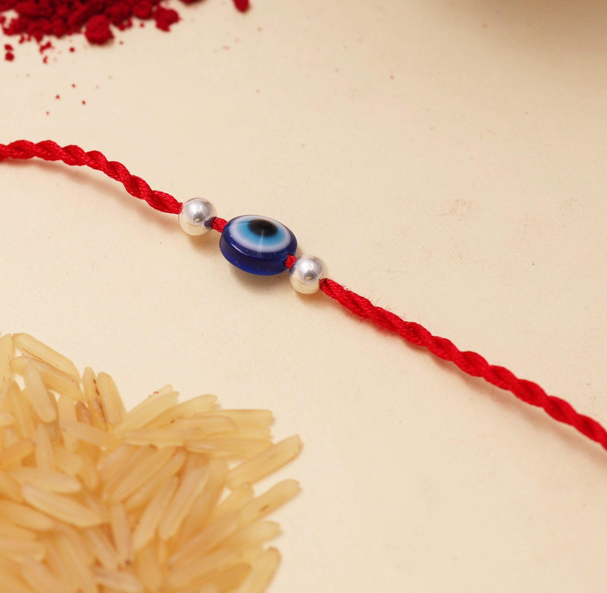 Evil Eye Rakhi for Brother in 925 Sterling Silver | Red Thread
